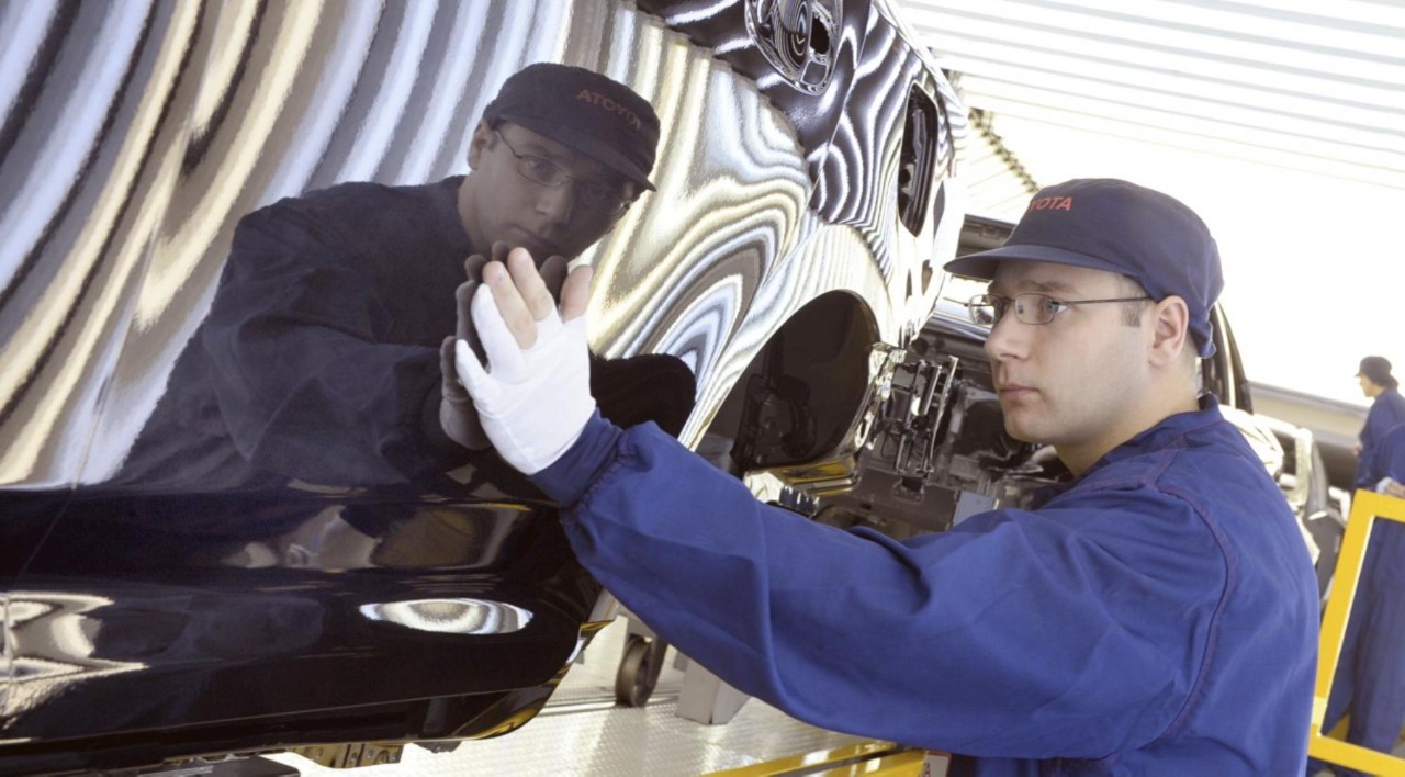 Toyota employee checking quality